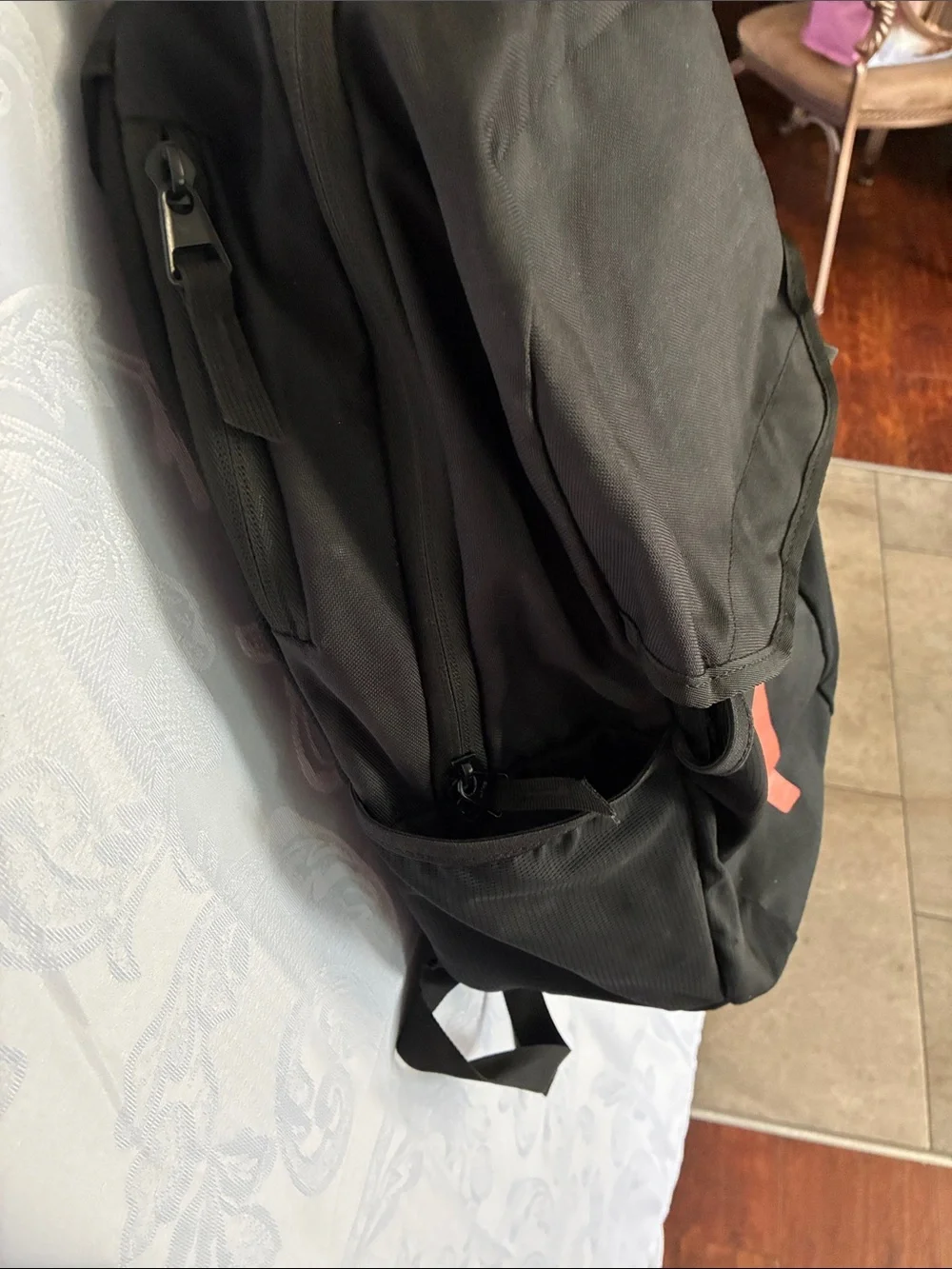 Nike Black Backpack with Neon Yellow Swoosh and Red Stripe Accents